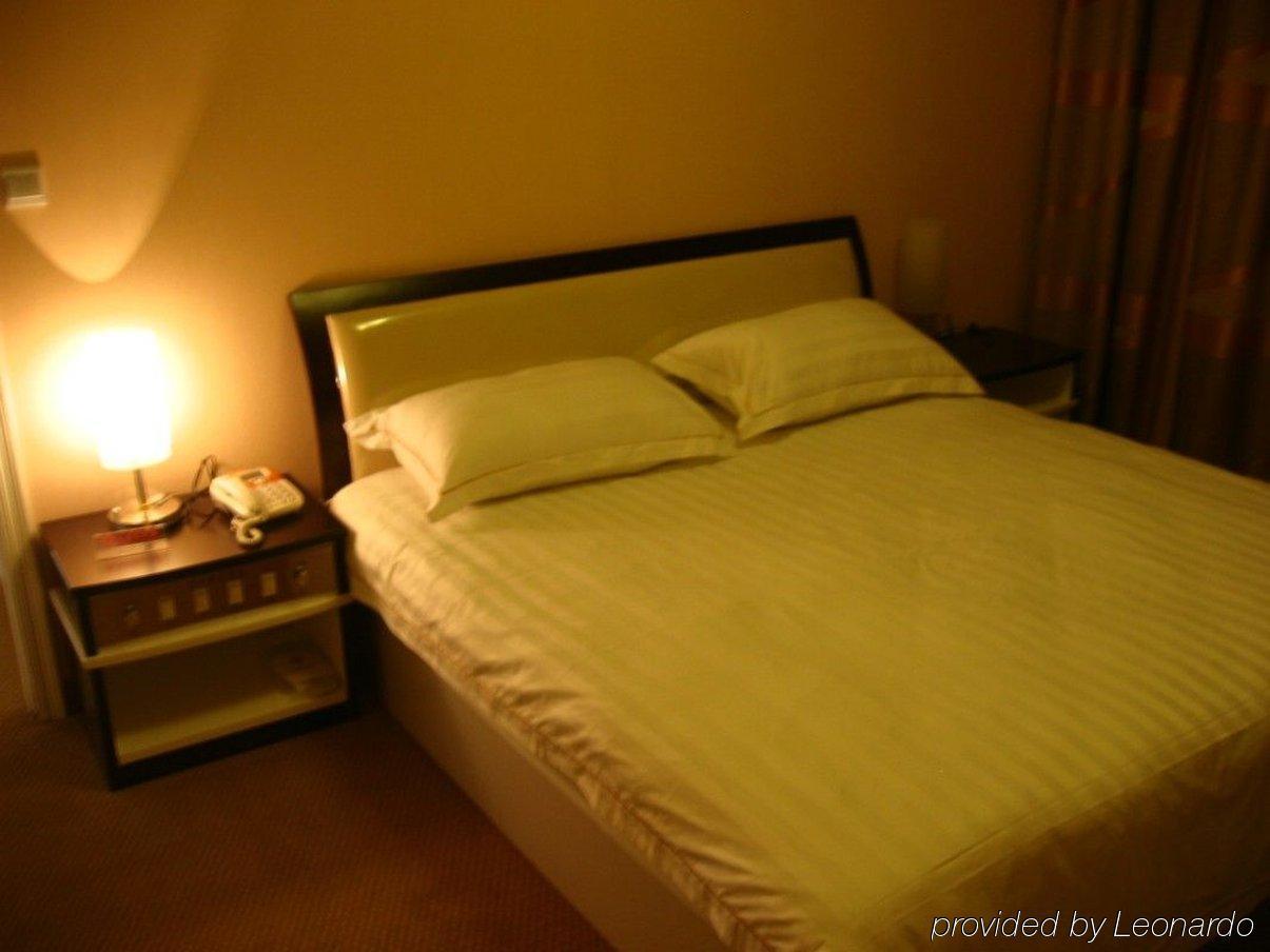 Jiujiu Holiday Hotel Shanghai Zimmer foto