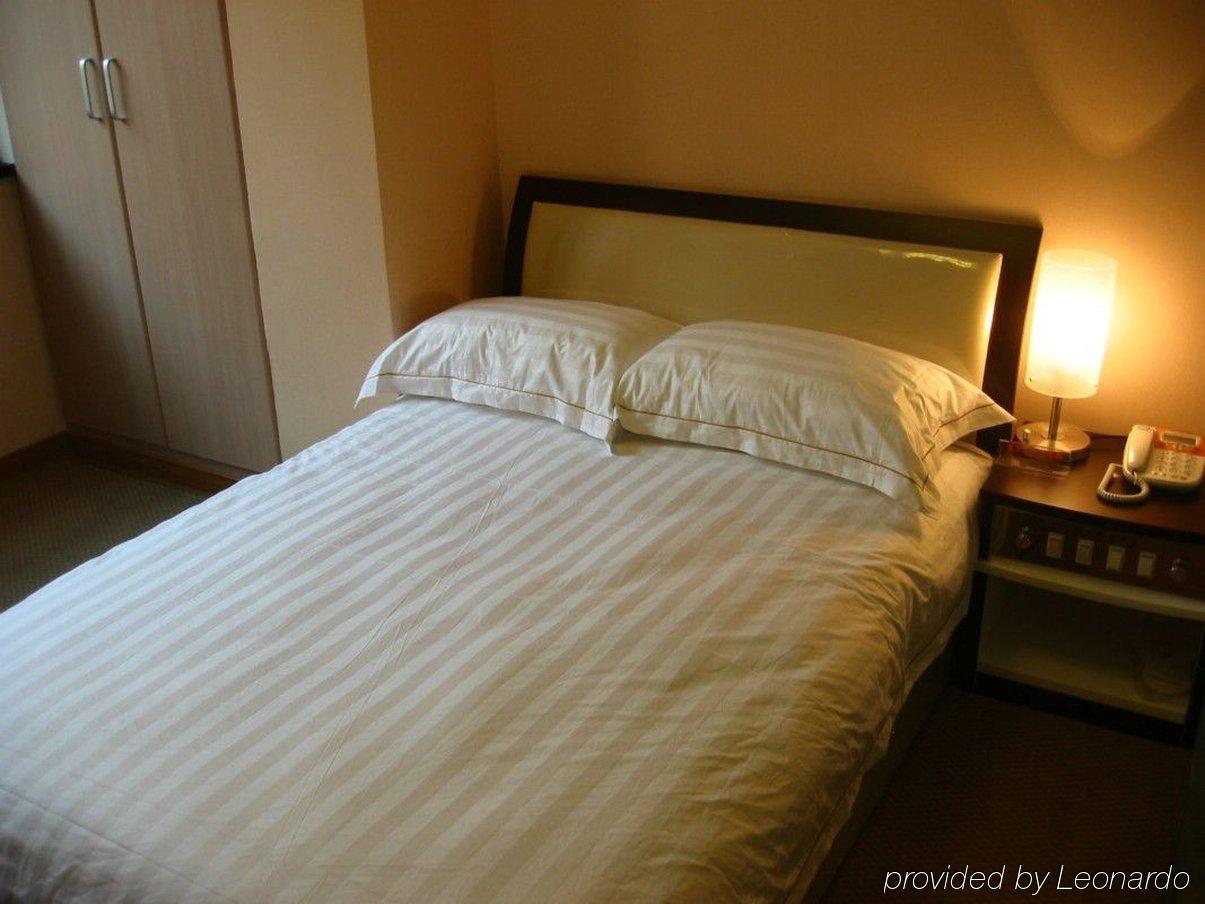 Jiujiu Holiday Hotel Shanghai Zimmer foto