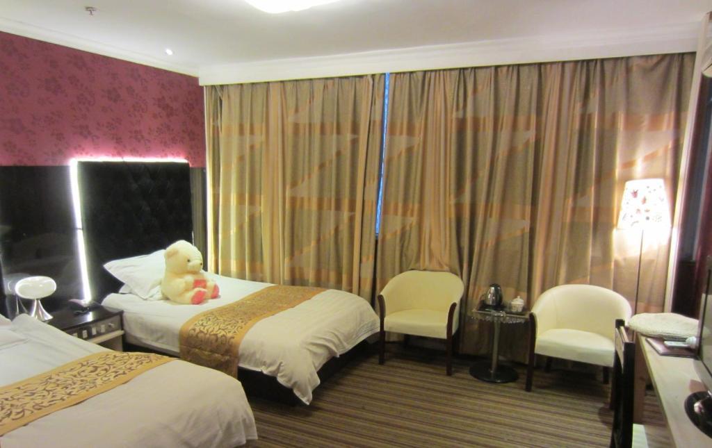 Jiujiu Holiday Hotel Shanghai Zimmer foto