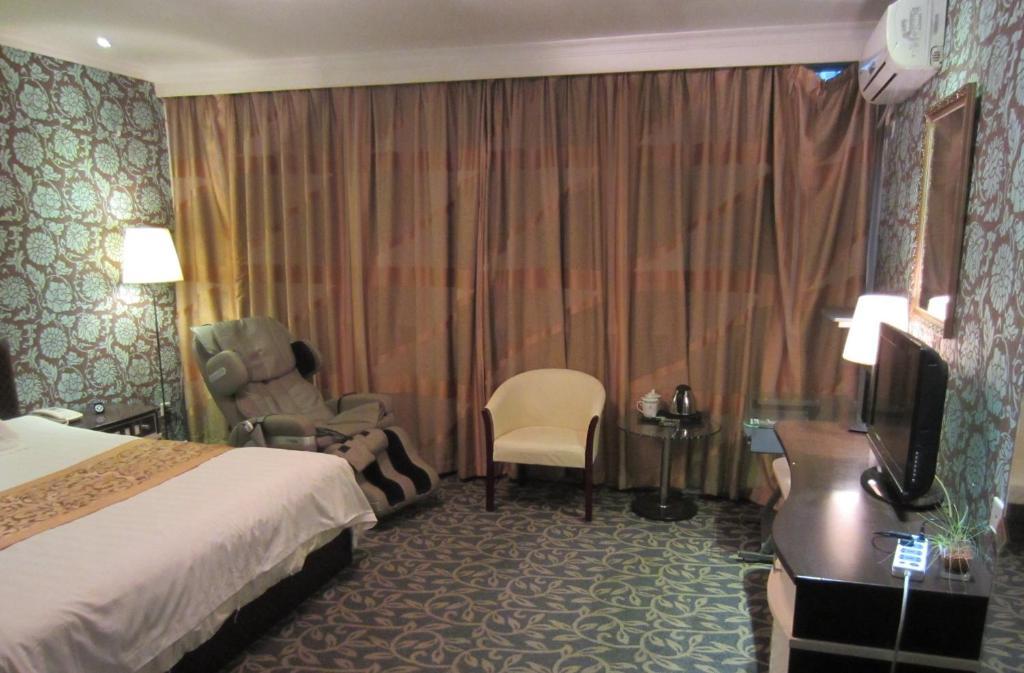 Jiujiu Holiday Hotel Shanghai Zimmer foto